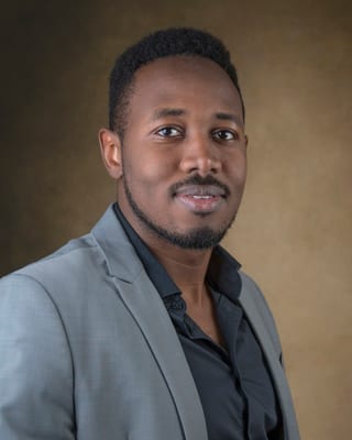 Ali M.